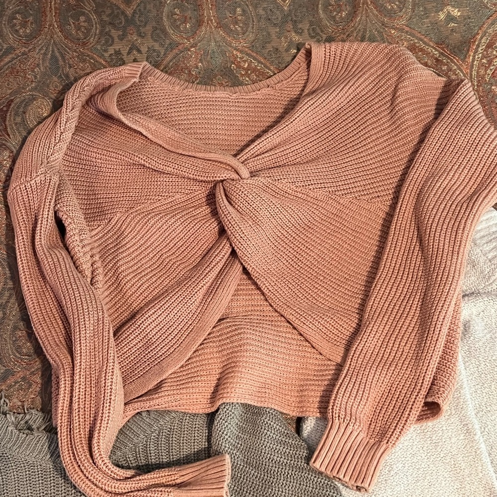 Beautiful cinched sweater. Never worn